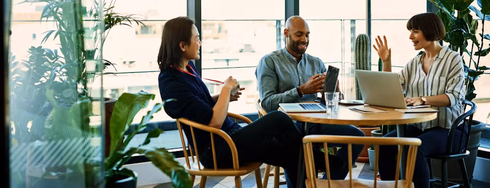 Team of professionals at Neorotech working together in an office